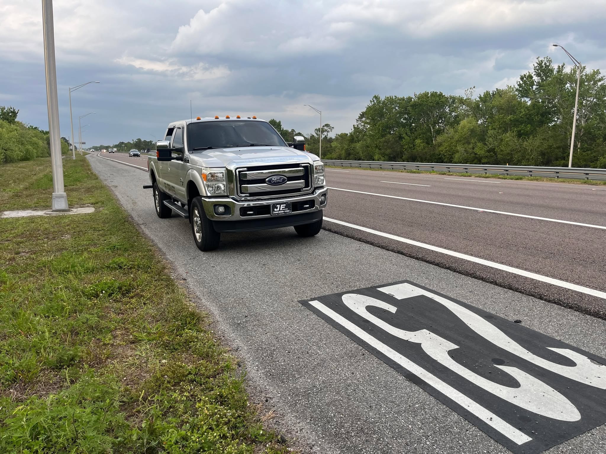 JF Drives LLC truck positioned roadside along US-1 in North Brevard County, Florida